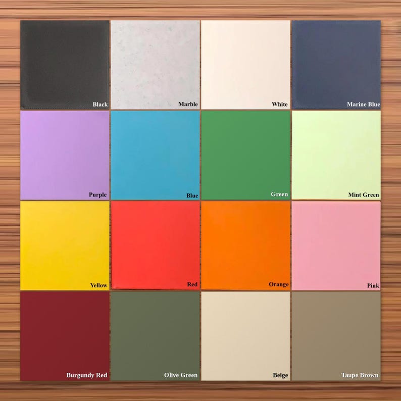 May include: A grid of sixteen square tiles in various solid colors including black, marble, white, marine blue, purple, blue, green, mint green, yellow, red, orange, pink, burgundy red, olive green, beige, and taupe brown with labels.