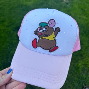 May include: A rustic wooden sign with the text "Welcome to our home" in white lettering. The sign features a distressed finish and a simple, inviting design, perfect for a front porch or entryway.