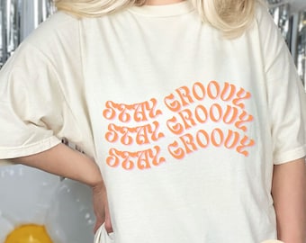 グルーヴィーなテーマのパーティーTシャツ、70年代テーマのシャツ