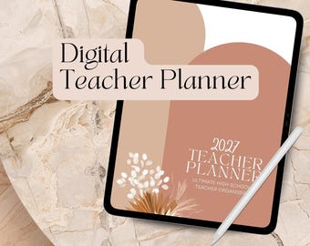 May include: A digital tablet displaying a 2027 teacher planner with a terracotta and beige abstract arch design. The screen shows the text Digital Teacher Planner, 2027 Teacher Planner, and Ultimate High School Teacher Organiser with a dried floral graphic.