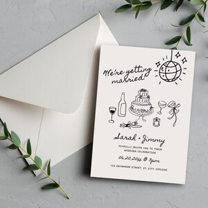 May include: A black and white wedding invitation featuring a disco ball, cake, wine glasses, and the text "We're getting married!"  Sarah and Jimmy joyfully invite you to their wedding celebration on 20 June 204 at 3pm. The invitation includes the address 123 Anywhere Street, St, City, Zipcode.