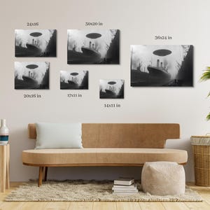 May include: A black and white photo of a ship with a flying saucer hovering above it. The photo is available in various sizes, including 14x11 inches, 17x11 inches, 20x16 inches, 24x16 inches, 30x20 inches, and 36x24 inches.