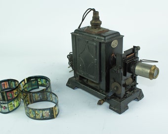 Antique film strip projector 35mm - with some prints (made in Germany EP)