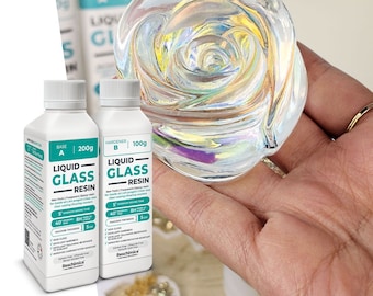 Transparent 2:1 epoxy resin, water effect, ideal for DIY jewelery creation, artisanal artistic decoration.