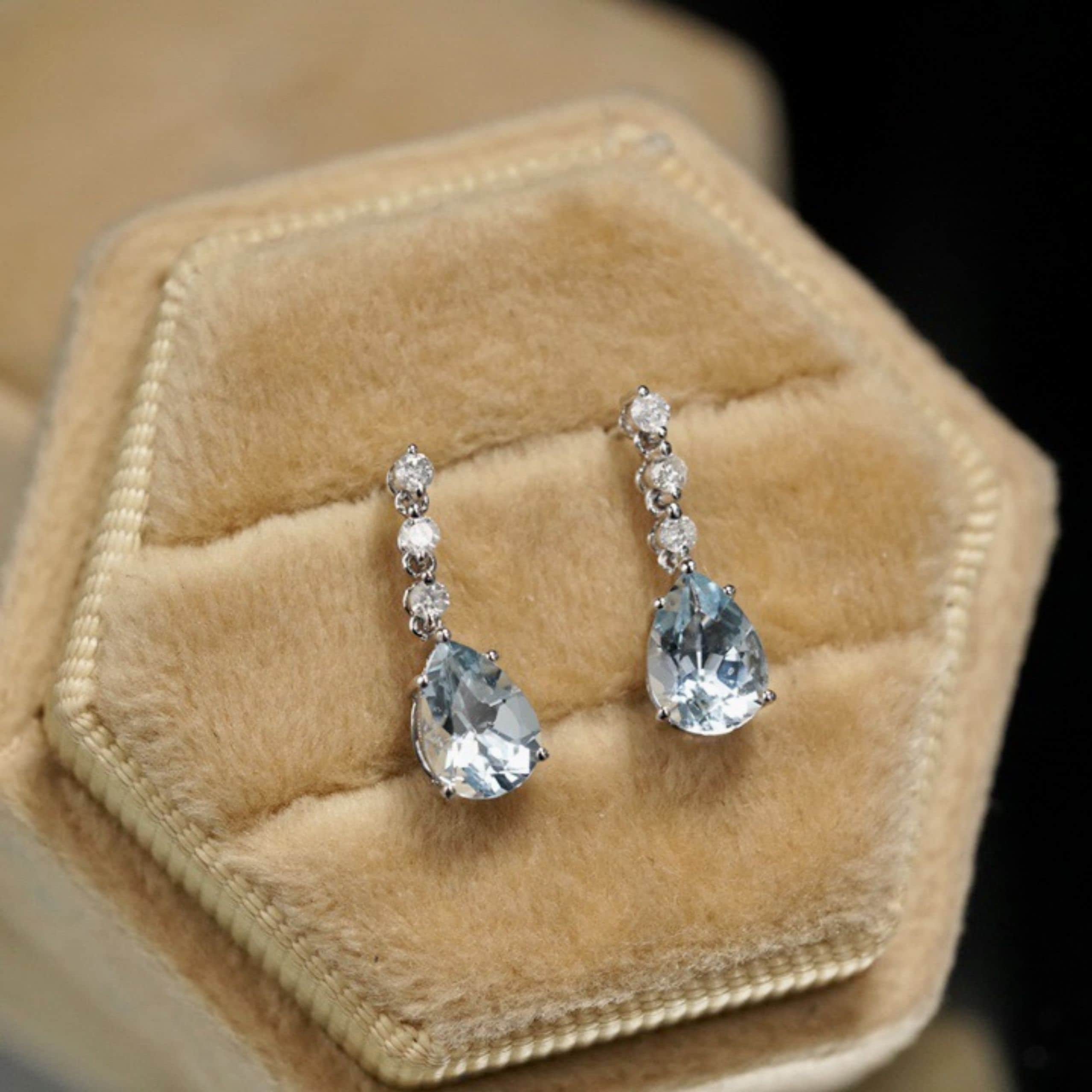 Pendientes De Flor De Plata De Ley Con Topacio Azul Londres