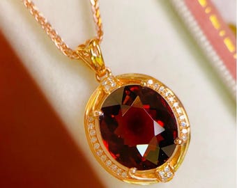 18k Gold Red Tourmaline Pendant: Oval Cut Diamond Accent