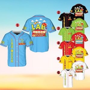 May include: A collection of baseball jerseys in various colors, including light blue, black, green, red, yellow, and white. Each jersey features the text "LAB WEEK" and "LAB STORY" with a microscope graphic. The jerseys have the numbers "26" and "20".