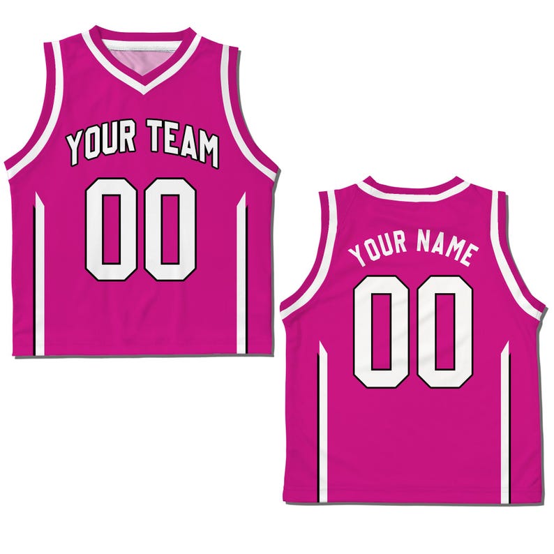May include: Pink basketball jersey with white trim and white lettering. The front of the jersey says "YOUR TEAM" and has the number "00". The back of the jersey says "YOUR NAME" and has the number "00".