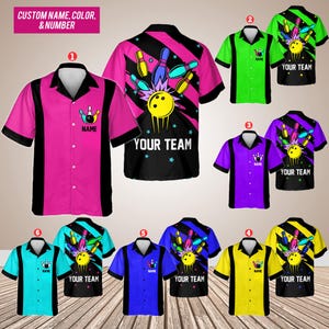 May include: Six different bowling themed shirts with a black and white bowling pin and ball design. The shirts are in various colours including pink, green, purple, blue, yellow, and turquoise. The shirts have the text "Your Team" and "Name" on them.
