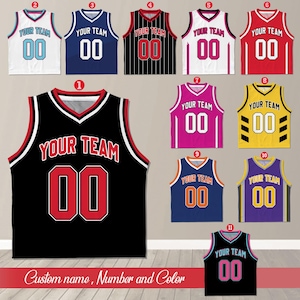 May include: Eleven different basketball jerseys in a variety of colour combinations. Each jersey has the text "YOUR TEAM" and the number "00" printed on the front.