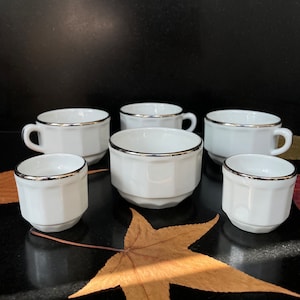 APILCO Porcelain 3 Demitasse Cups, Open Sugar pot and 2 Egg Cups in White by Yves DESHOULIÈRES. France.