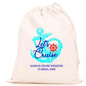May include: A cream-colored drawstring bag with a turquoise anchor design and the words "Let's Cruise." A red ship's wheel is in the center of the anchor. Below the design is the text "MARIA'S CRUISE WEEKEND FLORIDA, 2026."