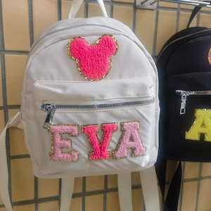 Kundenspezifischer Nylonrucksack mit Chenille-Buchstaben aufgenäht Personalisierter Rucksack mit Fleckenbuchstaben Mädchen Zurück zur Schule