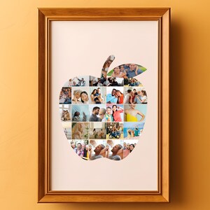 Op de afbeelding: Een ingelijste fotocollage in de vorm van een appel, met een verscheidenheid aan foto's van mensen, waarvan er veel lachen en glimlachen. De foto's zijn in een rasterpatroon gerangschikt, en de lijst is van lichtbruin hout.