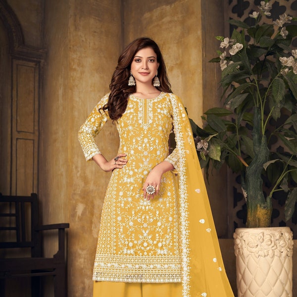 Il designer indiano di Bollywood di colore giallo Palazzo Salwar Kameez si adatta al lavoro di cordoncino di ricamo con abiti pronti per l'accoglienza delle donne pakistane