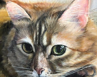 May include: Close-up painting of a tabby cat with green eyes. The cat is looking directly at the viewer with a soft expression. The painting is done in a realistic style with fine details.