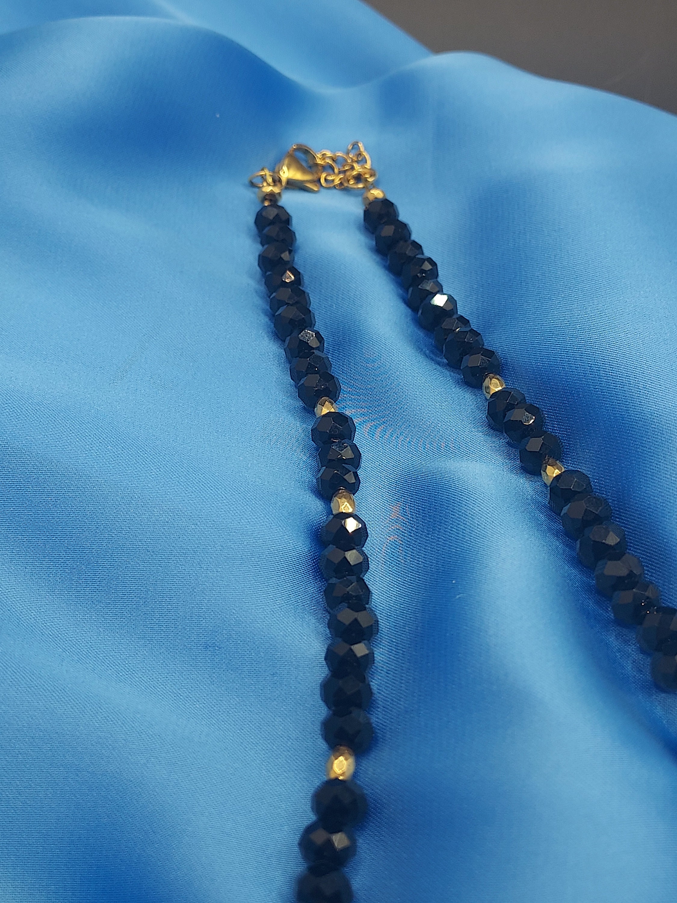 Lionheart Elegance: Handmade Black Crystal Necklace With Hematite 