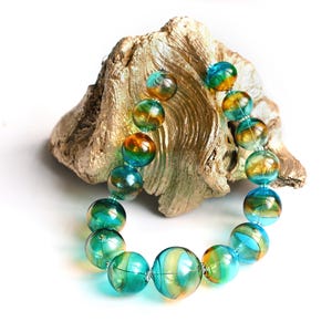 Handgeblasene Lampwork Halskette in Türkis und Bernstein SOFORT LIEFERBAR