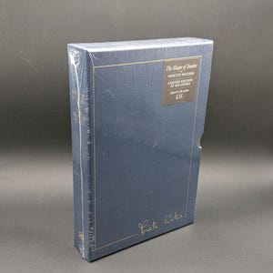 May include: A set of three ceramic mugs with a speckled, matte finish. The mugs are in shades of cream, light gray, and dark gray. Each mug has a simple, minimalist design, perfect for coffee or tea.