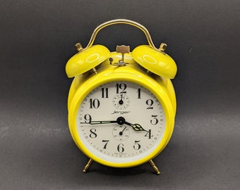 Réveil mécanique JERGER des années 1970, horloge de table jaune vif rétro allemande vintage, réveil de marque Jerger entièrement fonctionnel.