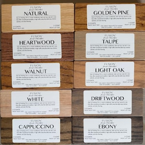 May include: Ten wood stain color samples with labels. The labels include the Fusion brand name, the color name, and instructions for applying the stain. The colors are: Natural, Golden Pine, Heartwood, Taupe, Walnut, Light Oak, White, Driftwood, Cappuccino, and Ebony.