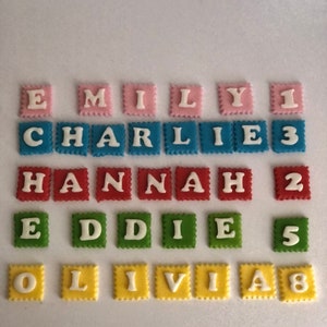 Edible name icing sugar paste personalised rainbow colours girls boys decoration