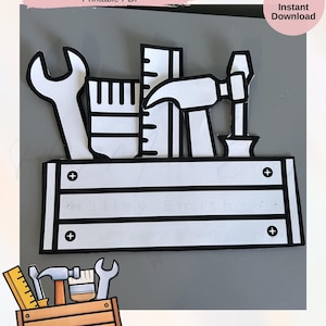 May include: A printable PDF activity featuring a black and white line art illustration of a wooden crate filled with tools including a wrench, ruler, hammer, and screwdriver. The text reads Create Build Play activity and Instant Download.