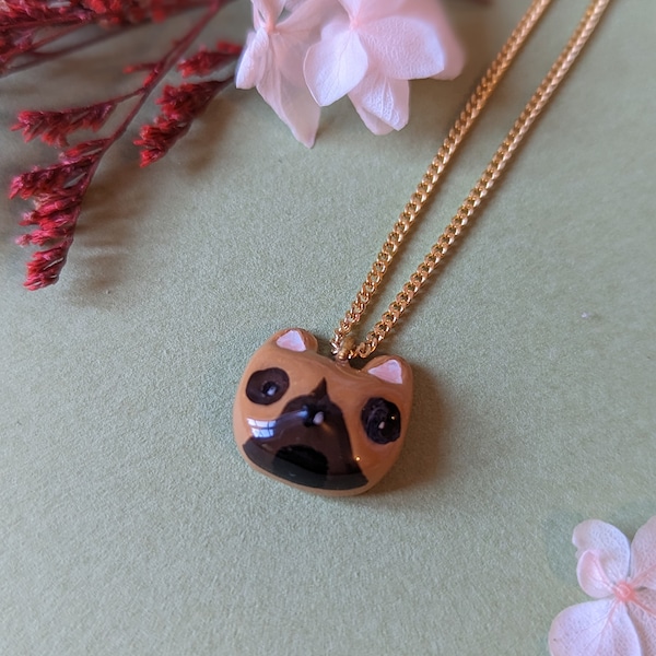 Collier orné d'une tete de bouledogue en fimo, bijou un peu kitsch pour les amoureux des chiens