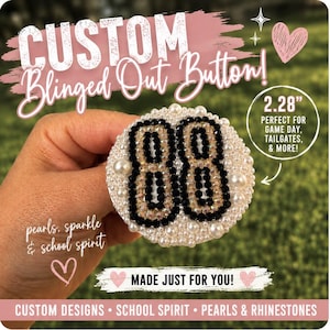 May include: A circular button featuring the number 88 in black and iridescent rhinestones, surrounded by a dense arrangement of white pearls and smaller clear rhinestones. The button measures 2.28 inches in diameter.