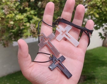 Resin cross pendant.