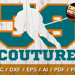 May include: A teal and orange number 59 with the word "COUTURE" underneath. The number is outlined in orange and the word is in teal. The image is on a woodgrain background.