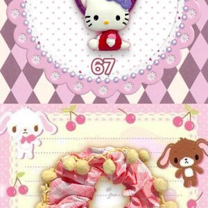 May include: A collection of hair accessories, including a Hello Kitty hair tie with a pink bow and a star wand, a Hello Kitty hair tie with a crown, and a pink and white plaid scrunchie with yellow pom-poms. The background is pink.