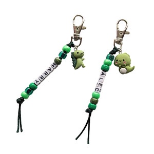 Dinosaur keyring, dinosaur gift, personalised custom keyrings, novelty keyring, personalise with a name, bag charm, party bag favour