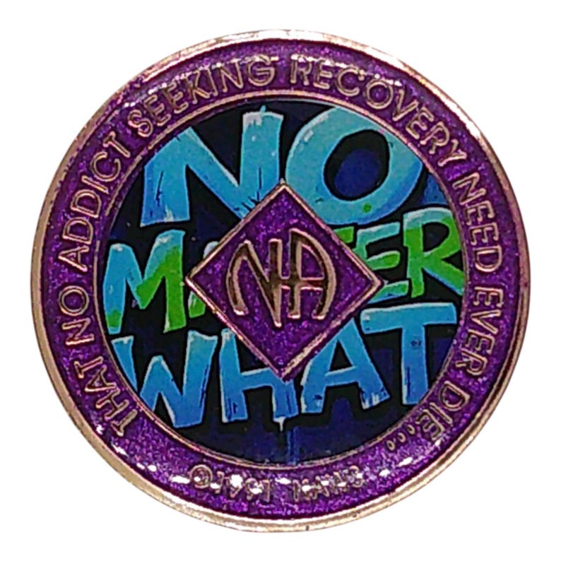 A purple recovery medallion featuring the text NO MATTER WHAT and the NA symbol.