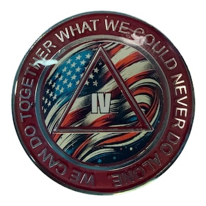 May include: A circular metal sobriety coin featuring a red border with the embossed text WE CAN DO TOGETHER WHAT WE COULD NEVER DO ALONE. The centre displays a stylised American flag background with a red triangle containing the Roman numeral IV.