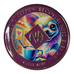 May include: Purple metal coin with a colorful image of a dog and a cup of coffee. The coin has the text "The Addict Seeking Recovery Need Ever Die" and "NA" in a diamond shape.