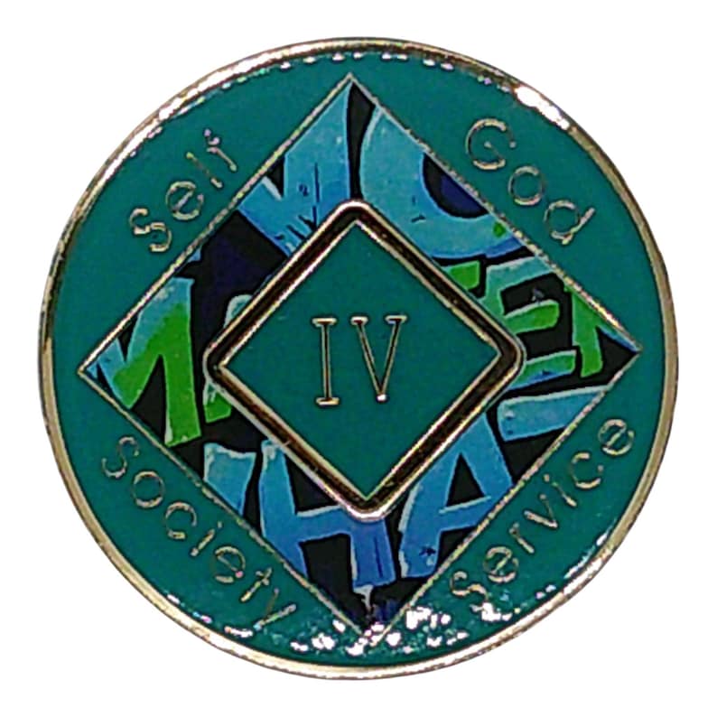The reverse side of a teal recovery medallion showing the roman numeral IV and Self, God, Society, and Service.