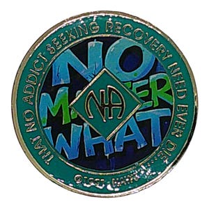 A teal recovery medallion featuring the text NO MATTER WHAT and the NA symbol.