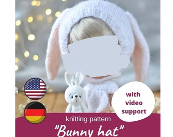 May include: Knitting pattern for a white bunny hat with pink ears. The pattern includes video support and is available in English and German. "Bunny hat" is written on the image.