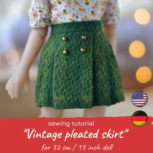 May include: Sewing tutorial for a vintage pleated skirt for a 13 inch doll. The skirt is green with gold buttons and is made of a textured fabric.