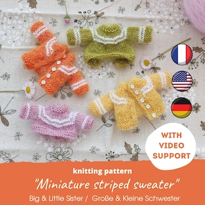 Könnte beinhalten: Strickanleitung für einen Miniatur-Streifenpullover. Die Anleitung enthält Anweisungen zum Stricken von zwei Pullovern, einem größeren und einem kleineren. Die Pullover sind in Orange, Rosa und Gelb dargestellt.