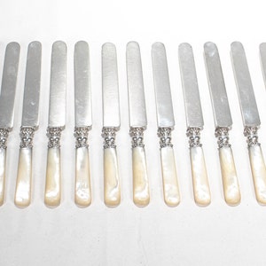 Complete Set of 12 Silver & Mother of Pearl Handled Dinner Knives