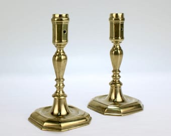 Pair of Early 18th Century French or English Faceted Brass Candlesticks