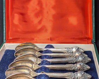 Vintage USSR coffee spoons with ornate pattern in original packaging