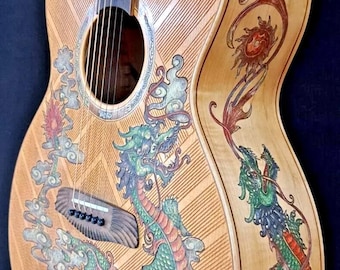 May include: A wooden acoustic guitar with a detailed dragon design. The guitar is painted with green, red, and blue colors. The dragon is depicted in a swirling, cloud-like pattern.