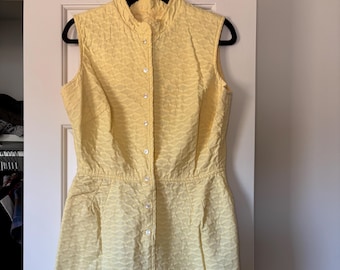 Vintage jurk jaren 60 botergele gewatteerde mouwloze jurk met zakken