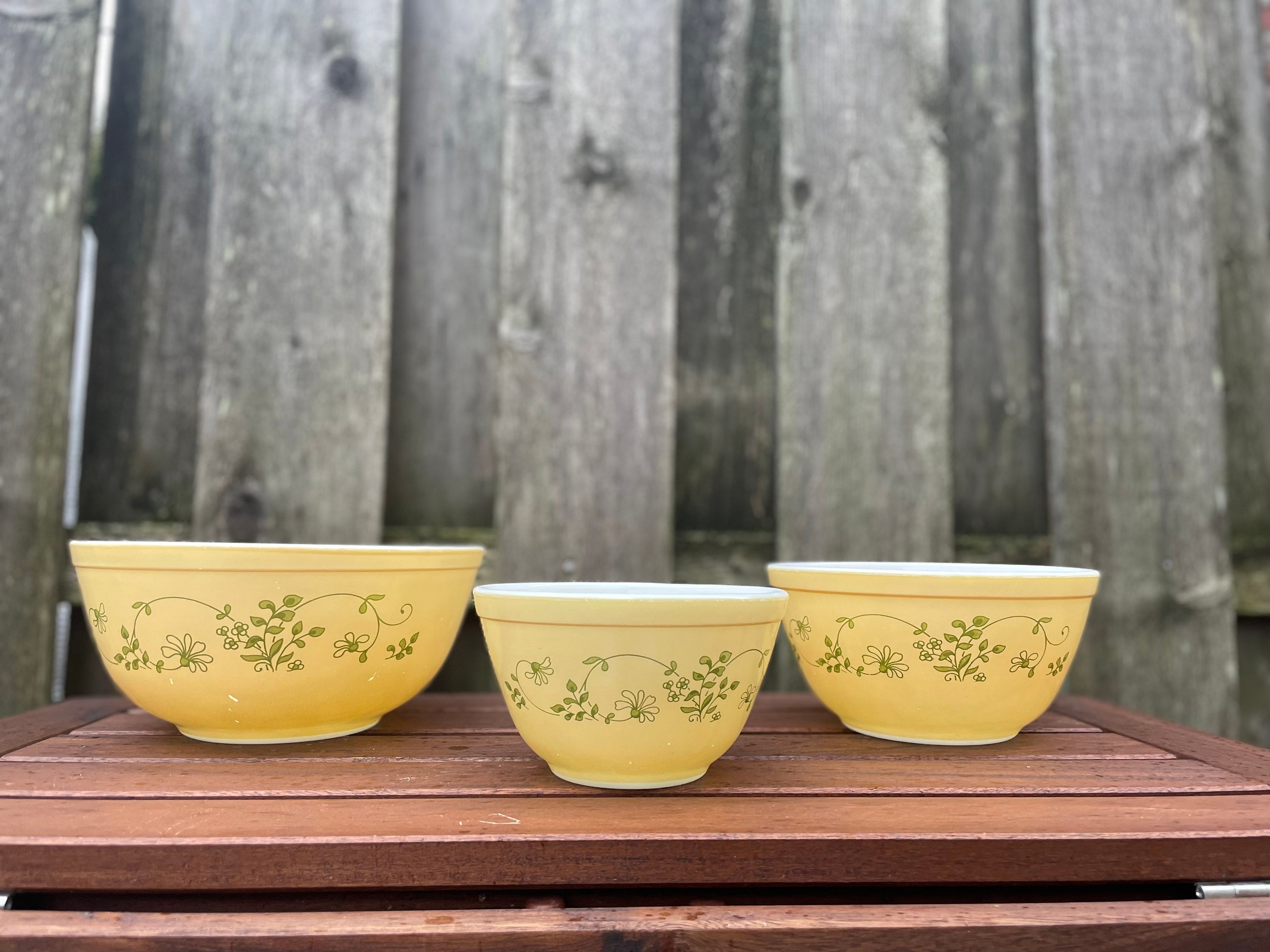 UNBRANDED set of three nesting glass prep bowls with lids pastel colors