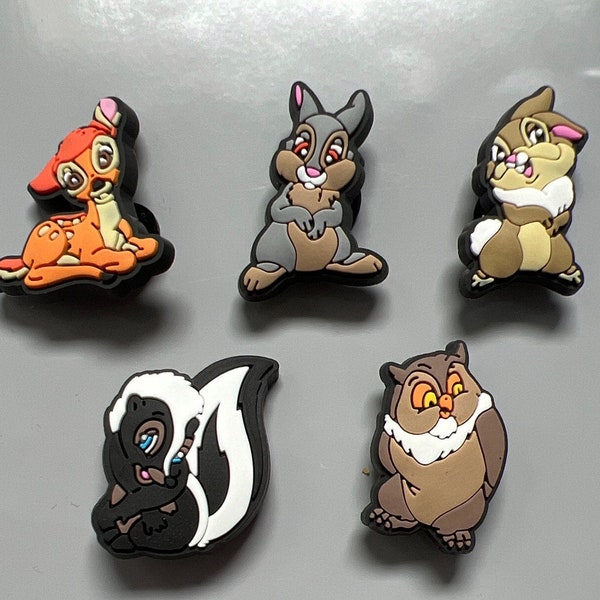 Character shoe charms- bambi crocaholic charm ,thumper  hatter , Cheshire Cat aristocats, Toy Story  charm, Dalmatian shoe  charm