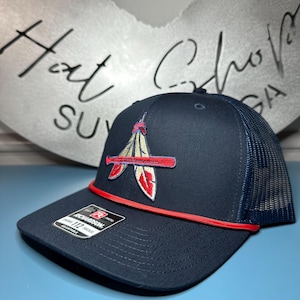 Custom “Braves Feather” Richardson 112 Trucker Hat with red rope.