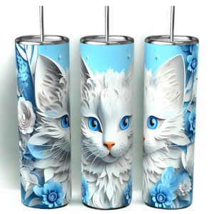 Edelstahl-Tumbler 590 ml mit weißer Katze und blauen Blumen, doppelwandig isoliert, inklusive Deckel und Edelstahl-Strohhalm. Hält Getränke 12 Stunden kalt oder 6 Stunden heiß. Hochwertig sublimiert, langlebig und wiederverwendbar. Perfektes Geschenk für Katzenliebhaber und Tierfreunde.